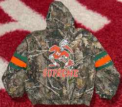 Supreme Mitchell & Ness NCAA Hooded Stadium Jacket Camo FW24